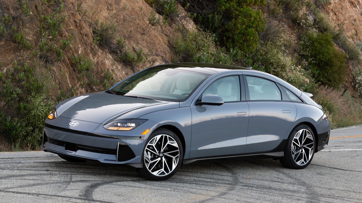 2025 Hyundai IONIQ 6 on a mountain road at sunrise.