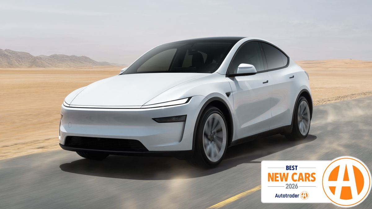 Tesla Model Y driving on the road.