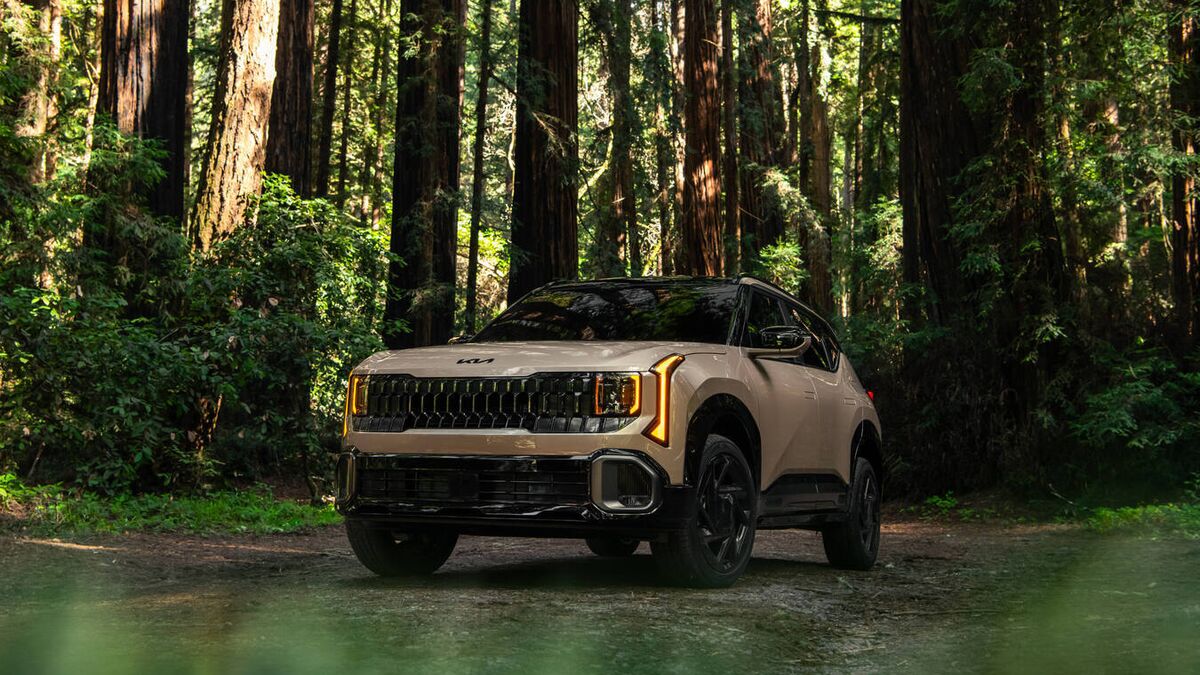 2027 Kia Seltos in a forest.