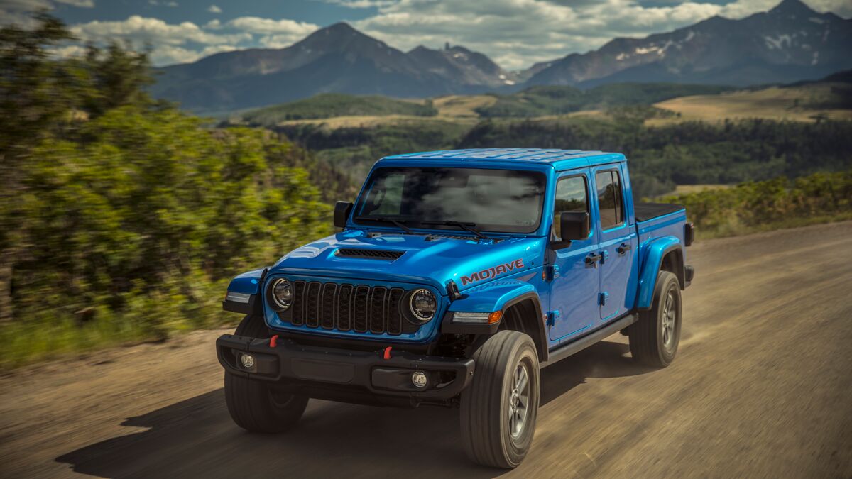 2026 Jeep Gladiator in blue on the road.