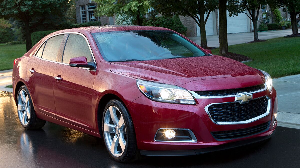 2015 Chevy Malibu in red.