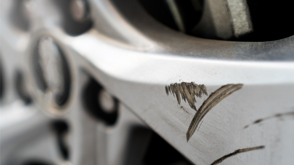 Aluminum alloy wheels with curb rash