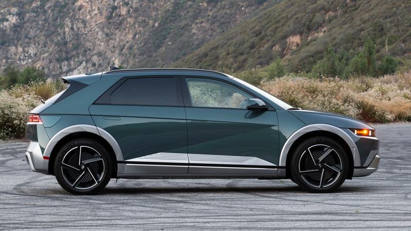 2025 Hyundai IONIQ 5 on a mountain road at sunrise.