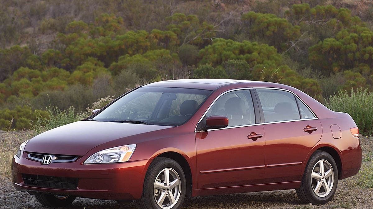 2004 Honda Accord in red.