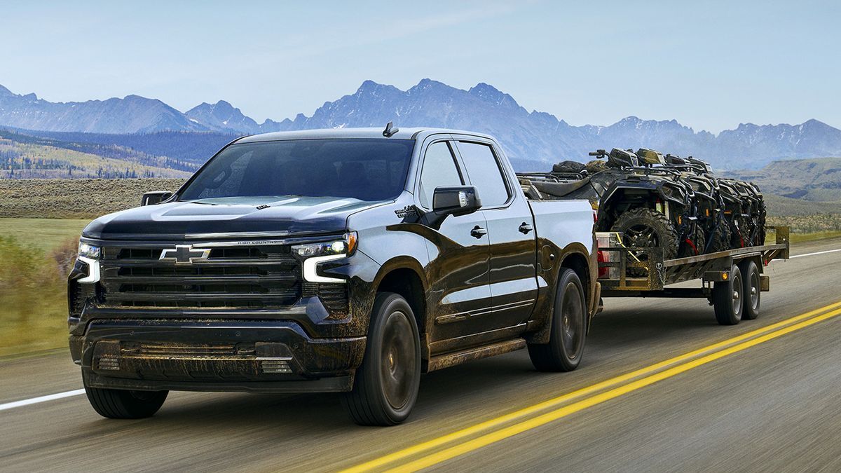 2025 Chevrolet Silverado 1500 towing a trailer.
