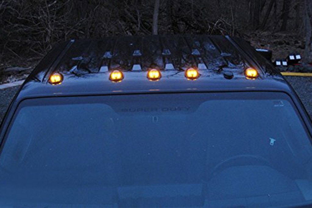 Here's Why Some Trucks Have Those Little Orange Lights on the Roof Autotrader