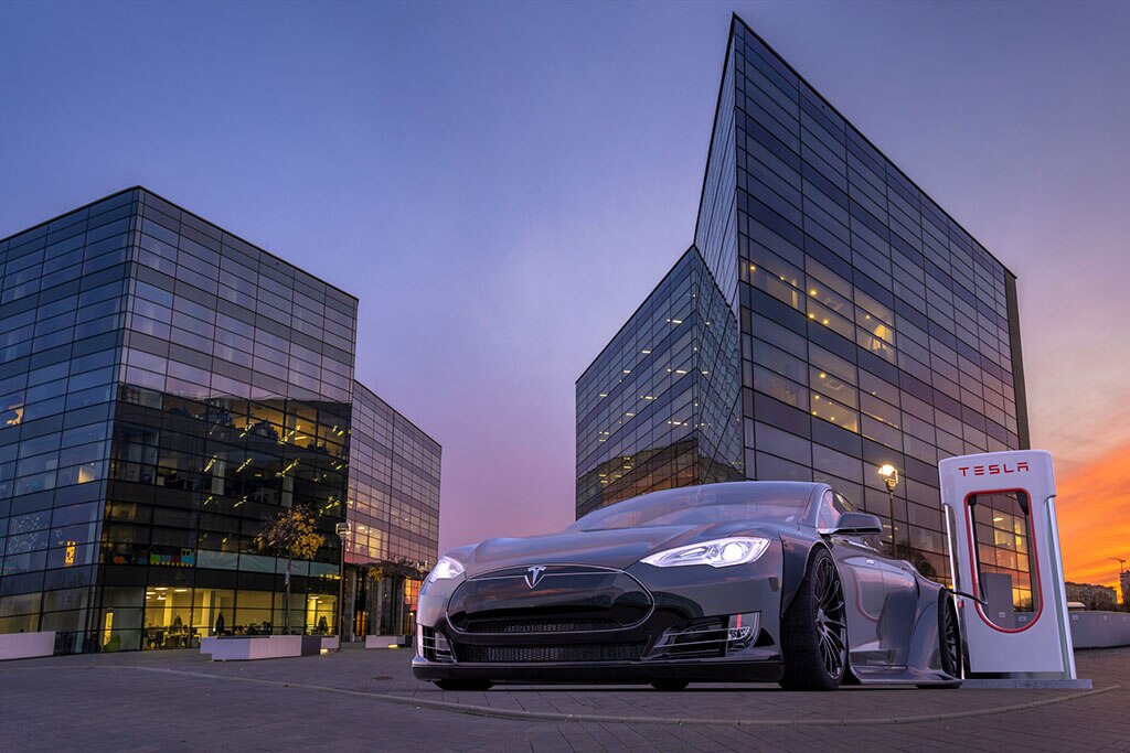 Tesla S electric car at charging station