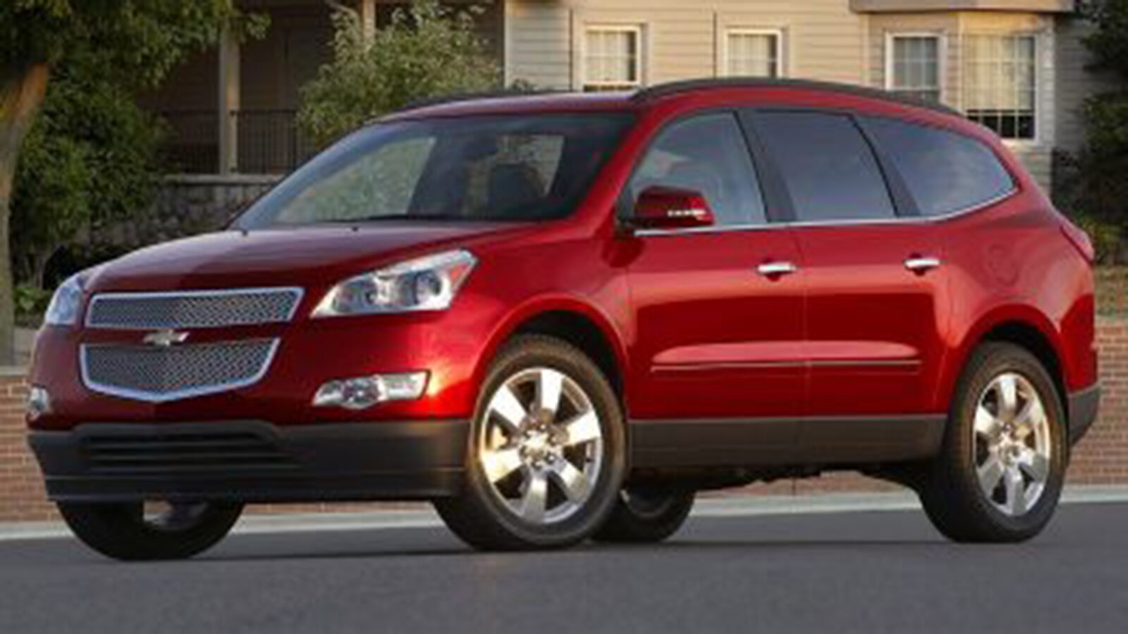 2012 Chevrolet Traverse delantero izquierdo en rojo