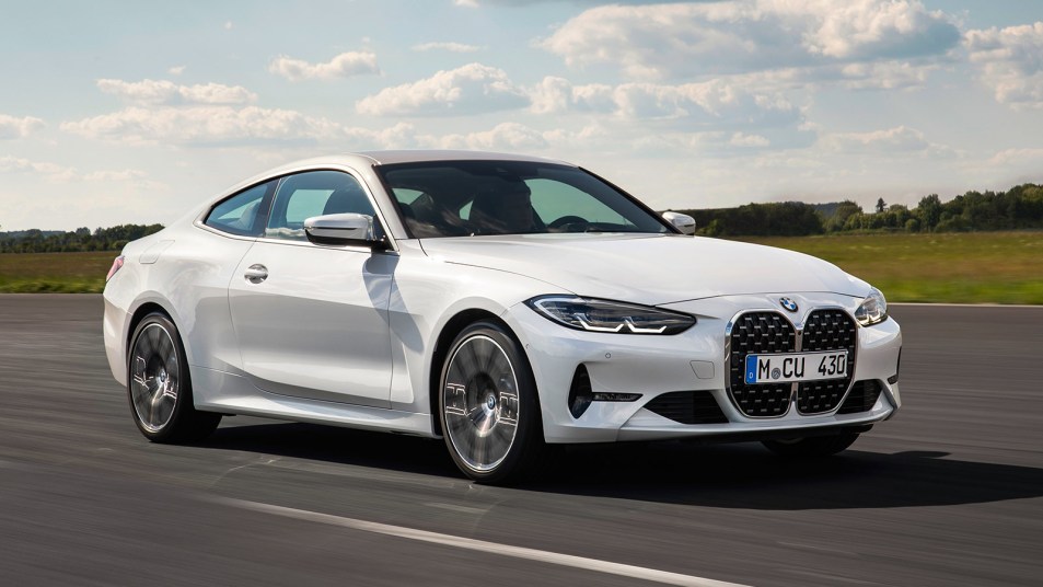 2022 BMW 430i in white driving