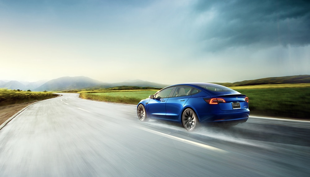 2022 Tesla Model 3 Rear Left Driving