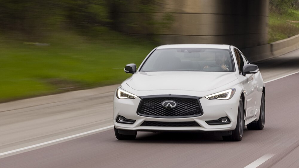2022 Infiniti Q60 Luxe Front Driving in White