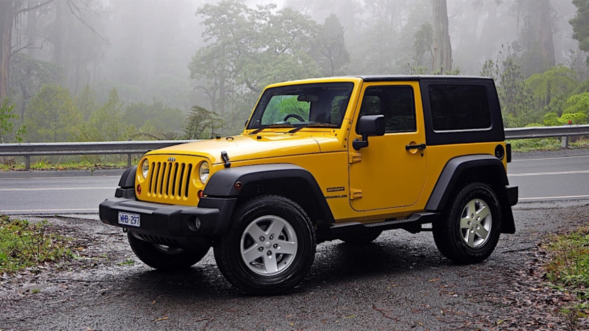 2022 Jeep Wrangler Sport front left in yellow