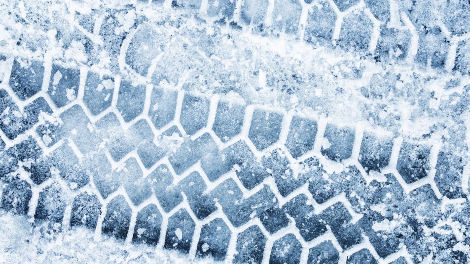 Winter tire tracks in snow