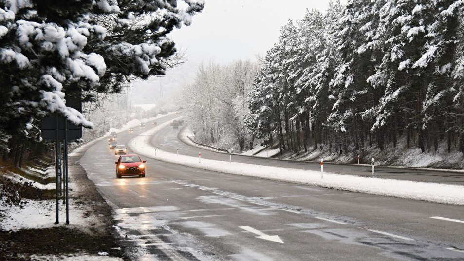 Cars driving on winter road