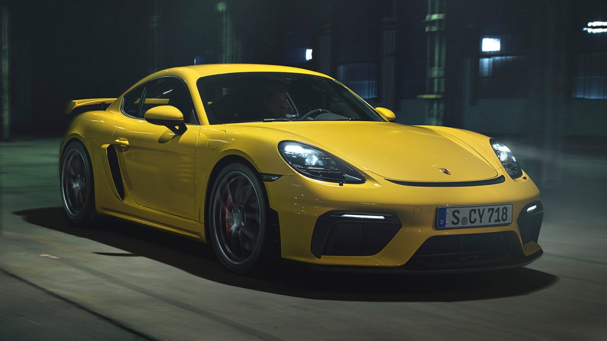 2022 Porsche 718 Cayman GT4 in yellow.