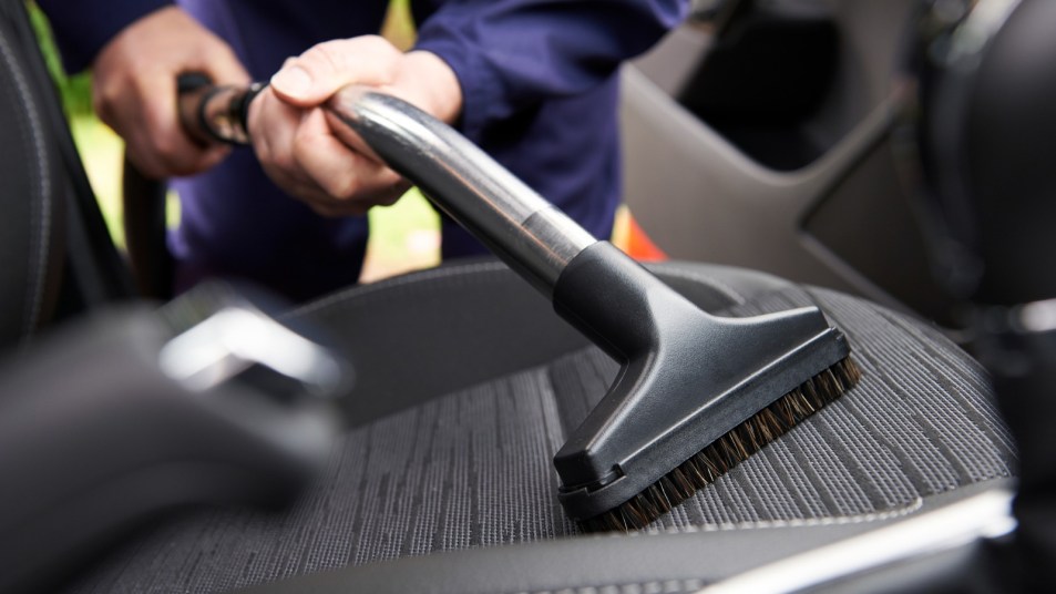 Vacuuming car interior