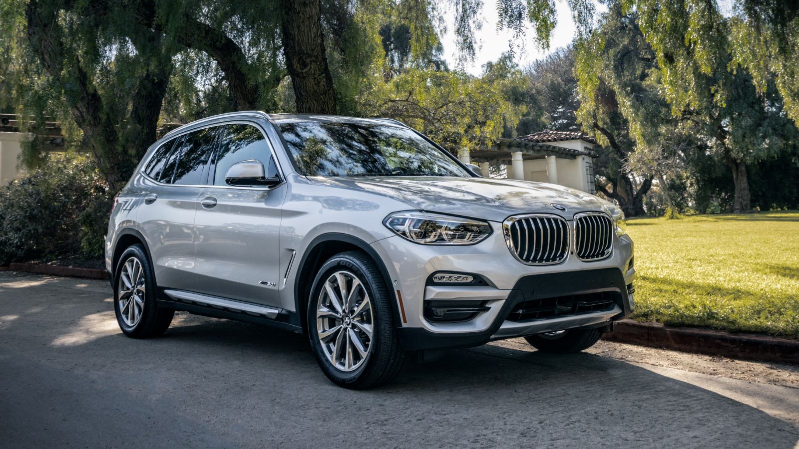 2019 BMW X3 near trees