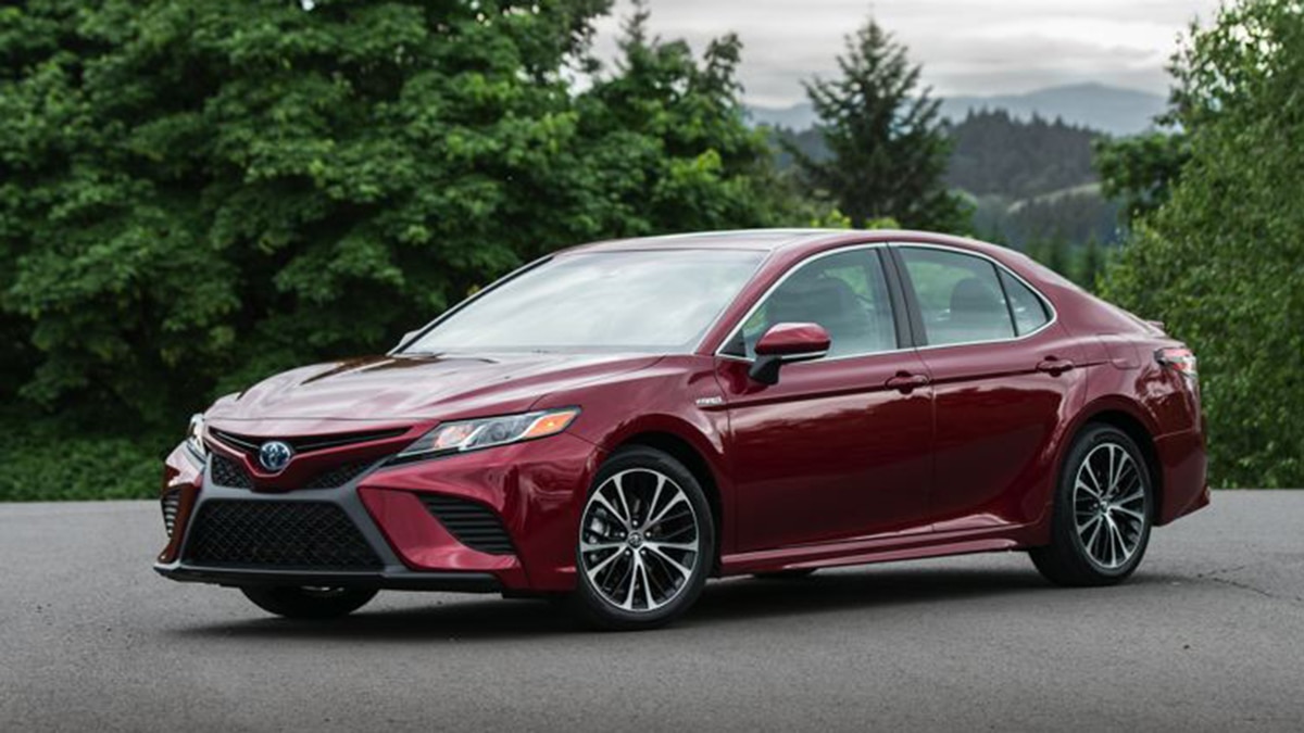 2019 Toyota Camry LE Hybrid front left in red