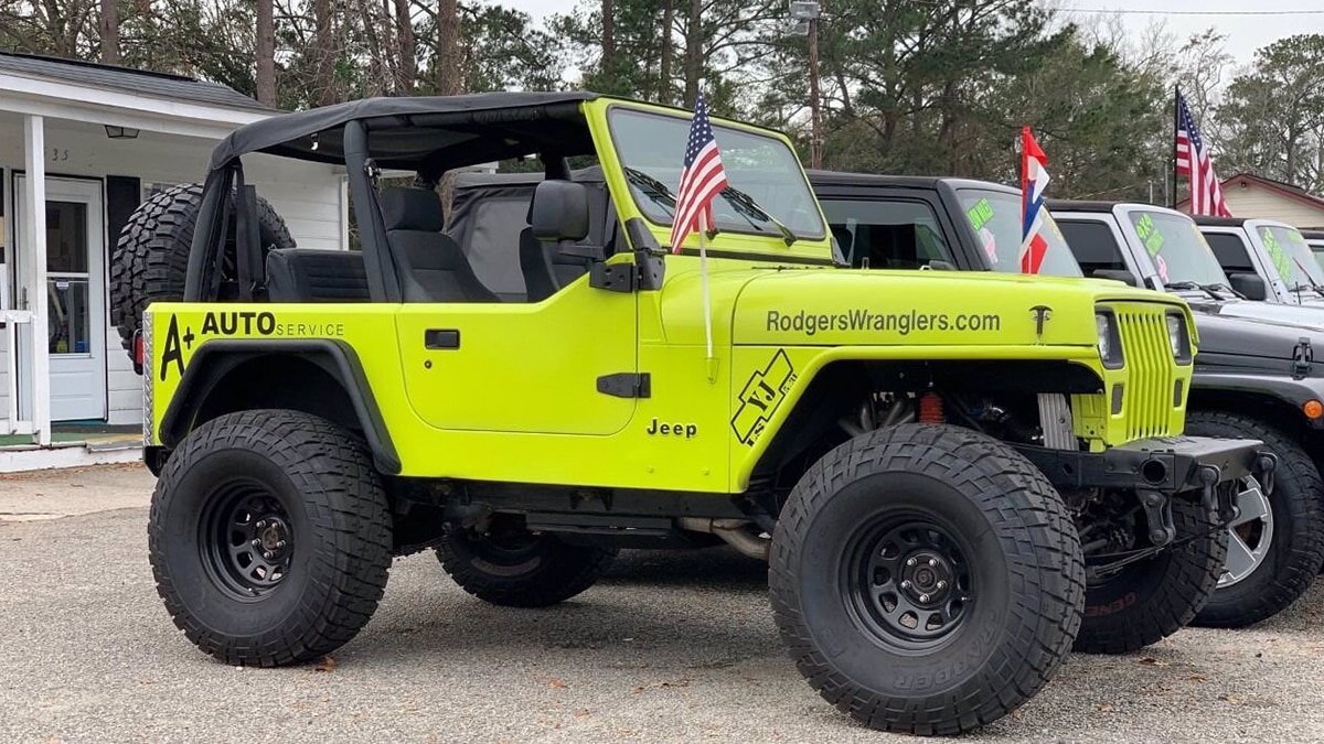 1995 Jeep Wrangler Rio Grande front right in yellow