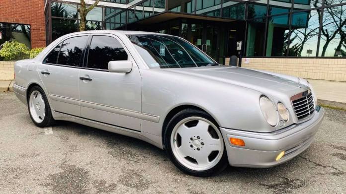 1999 Mercedes-Benz E55 AMG in silver.