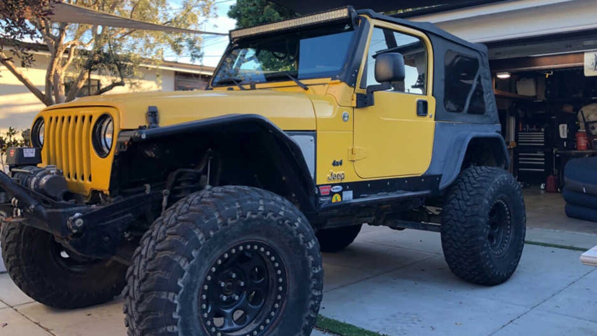 2006 Jeep Wrangler Rubicon front left in yellow