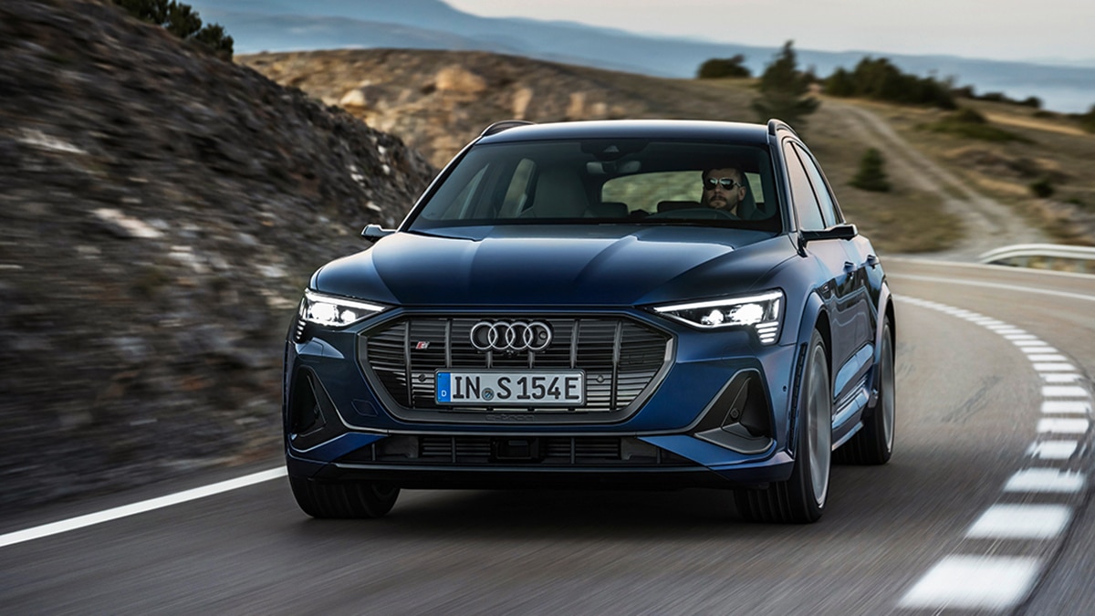 2023 Audi e-tron S driving in blue
