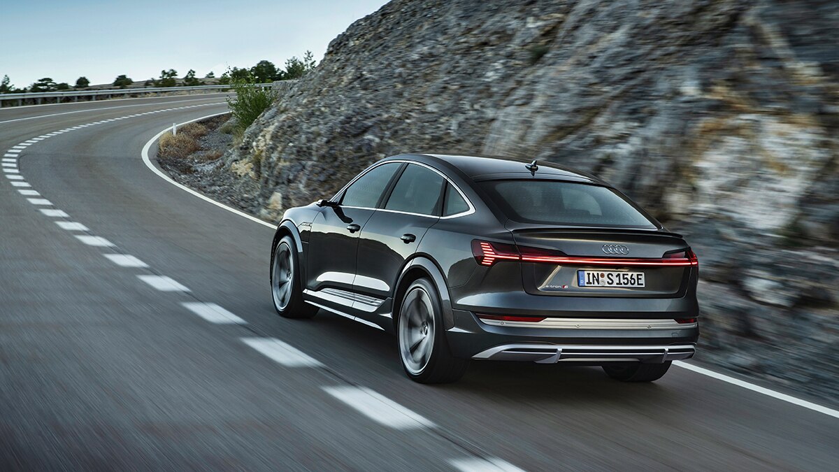 2023 Audi e-tron S Sportback rear left in black