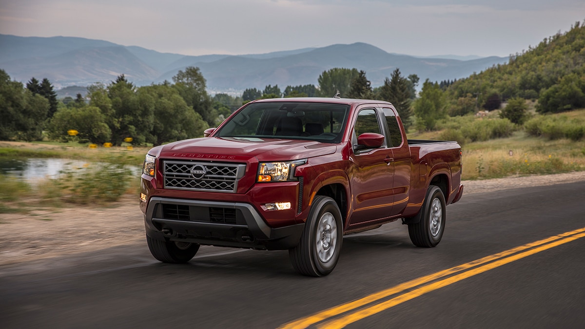 2023 Nissan Frontier SV King Cab front left in red