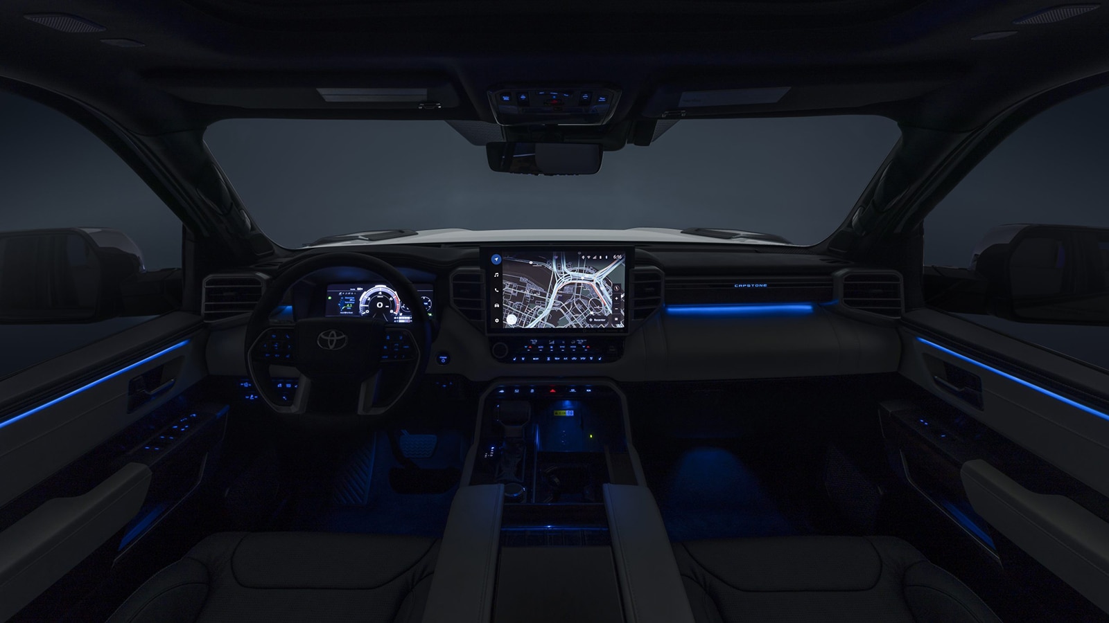 2023 Toyota Tundra Hybrid Capstone at night with blue lighting