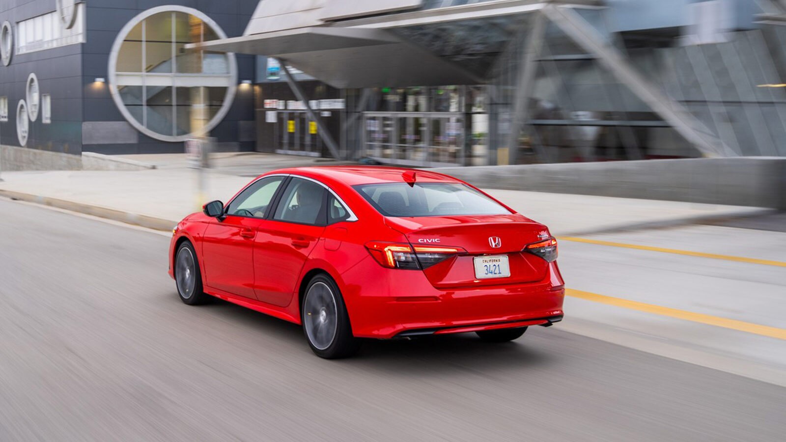 2023 Honda Civic Sedan Touring rear left in red