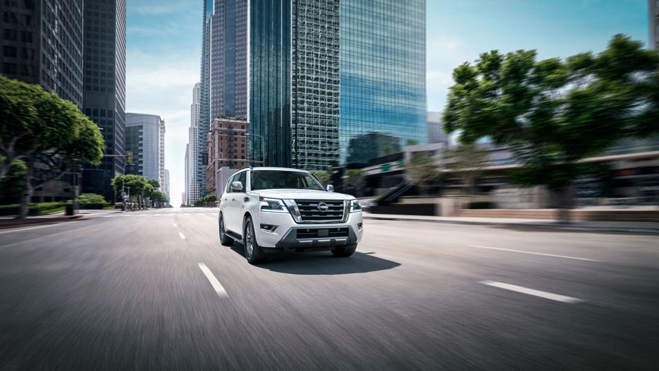 2023 Nissan Armada city driving in white