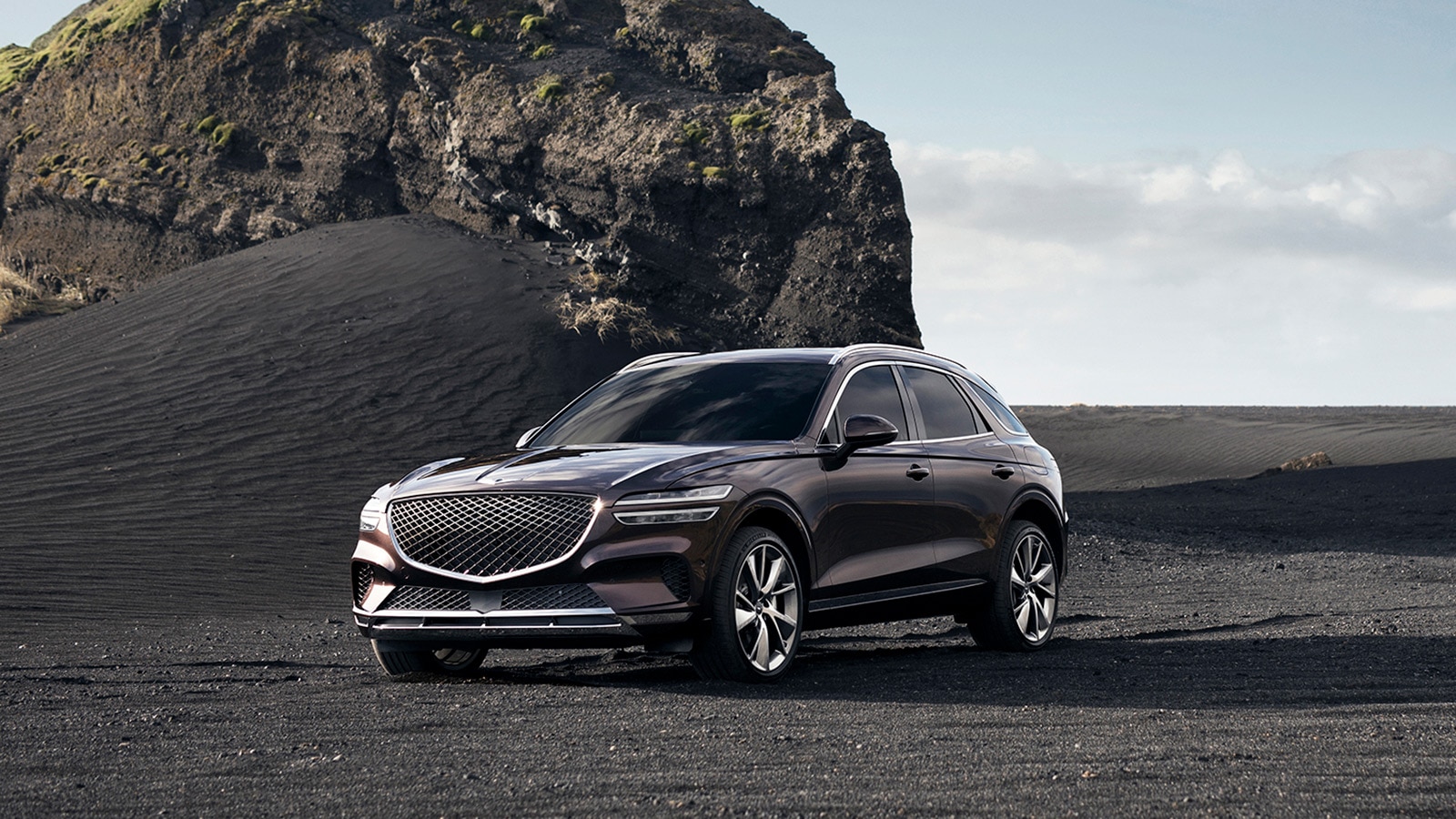 2022 Genesis GV70 front left in purple