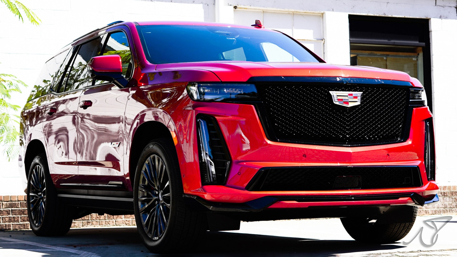2023 Cadillac Escalade V front right in red