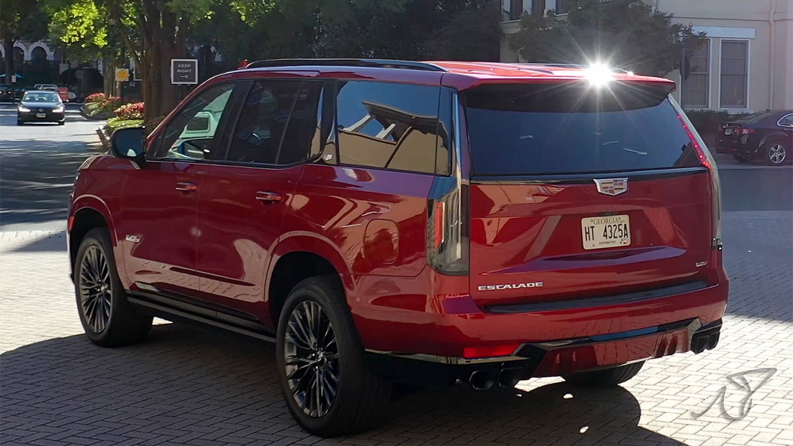 2023 Cadillac Escalade V left rear in red