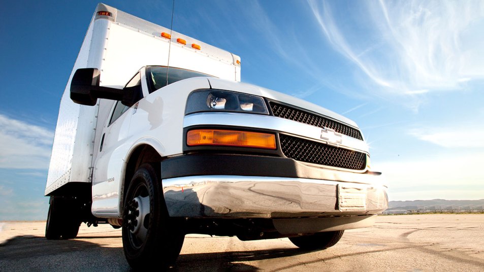 2023 Chevrolet Express Cutaway van in white.