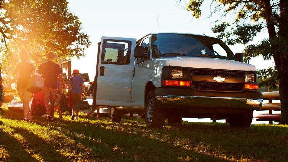 2023 Chevrolet Express Passenger van in white.
