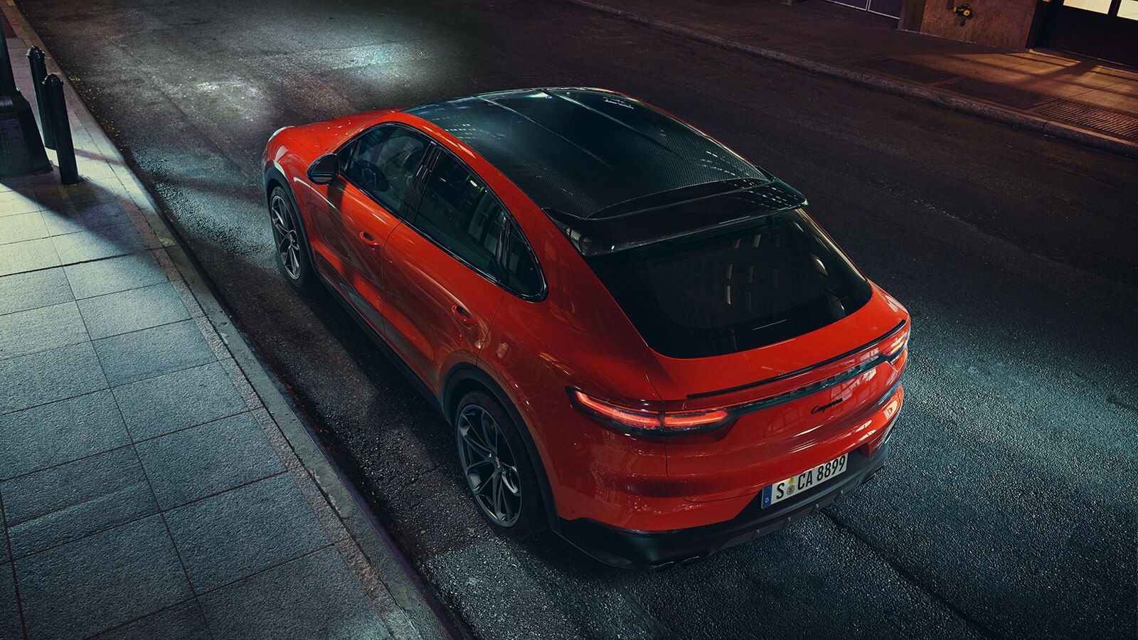 2023 Porsche Cayenne Coupe rear left in orange