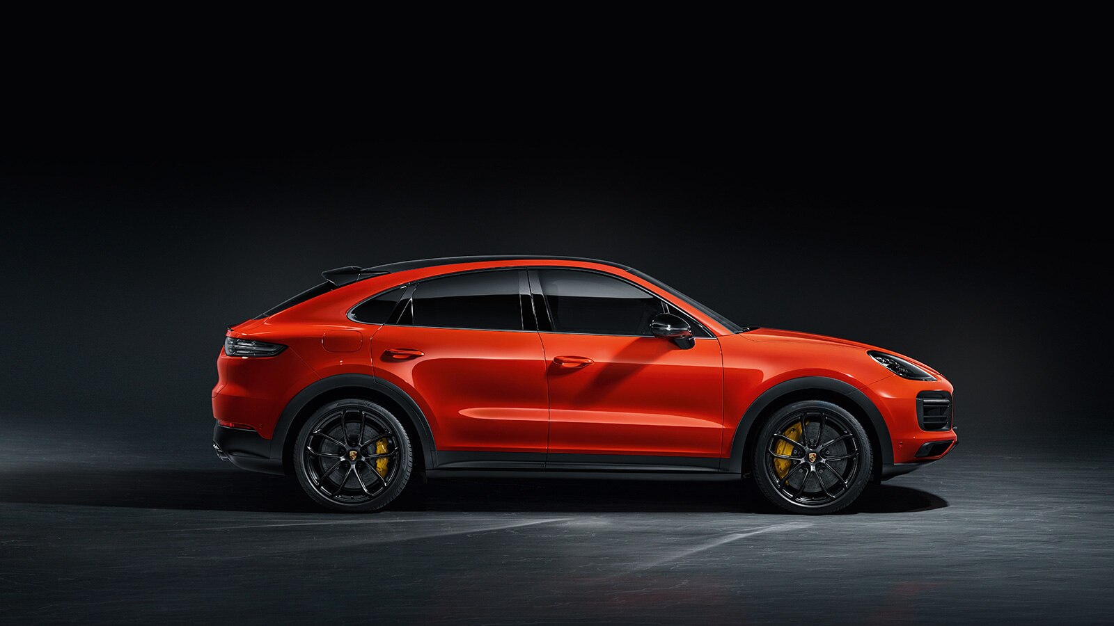 2023 Porsche Cayenne Coupe profile in orange