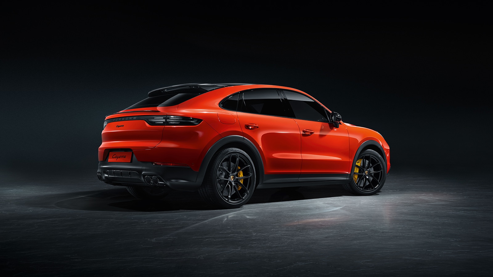 2023 Porsche Cayenne Coupe rear right in orange