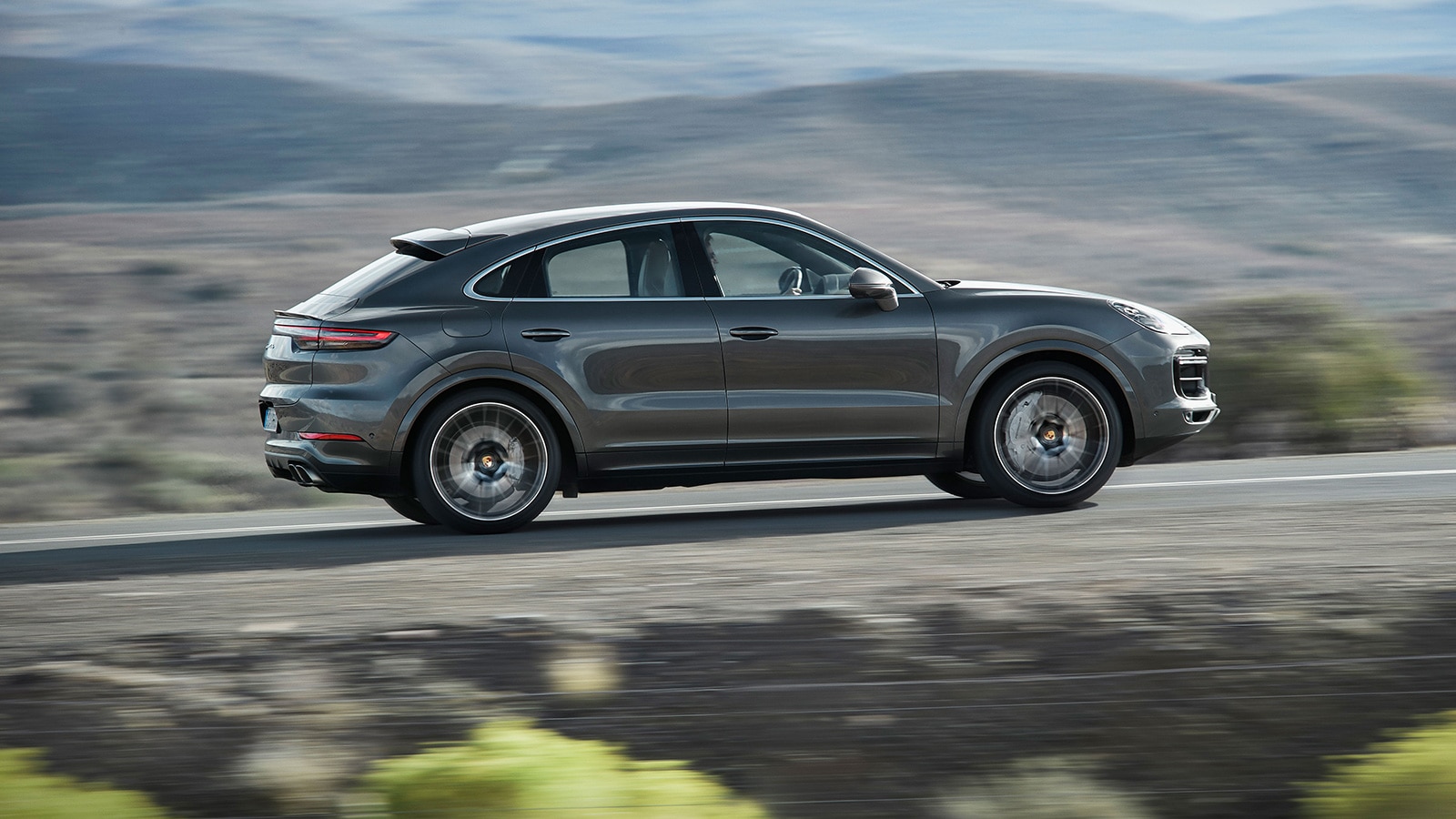 2023 Porsche Cayenne Coupe Turbo profile in metallic grey