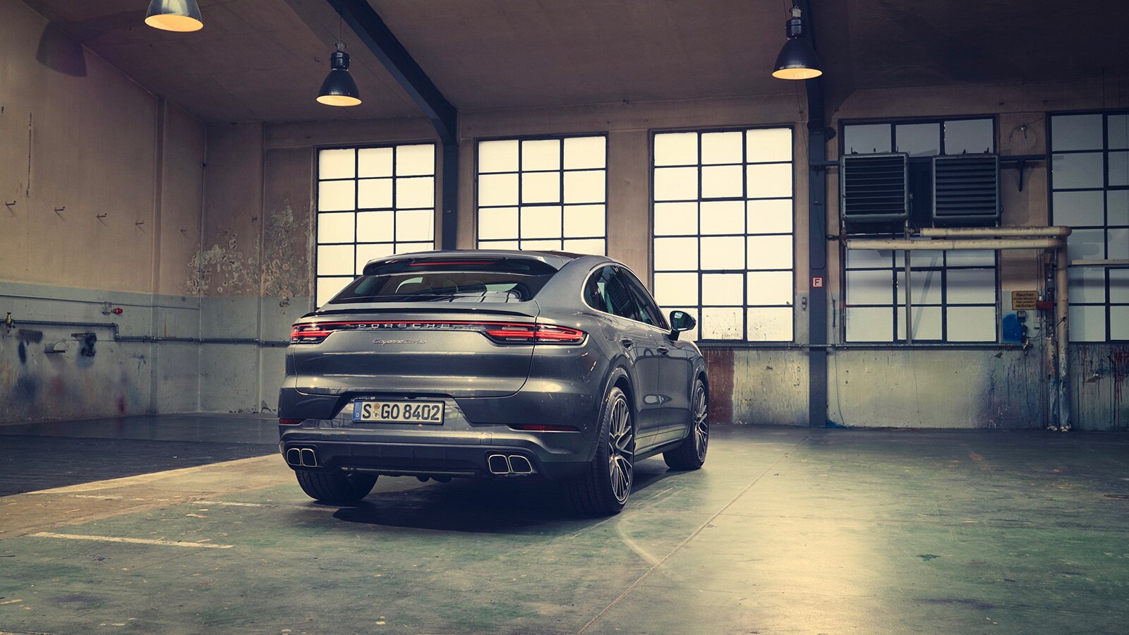 2023 Porsche Cayenne Coupe Turbo rear right in metallic grey