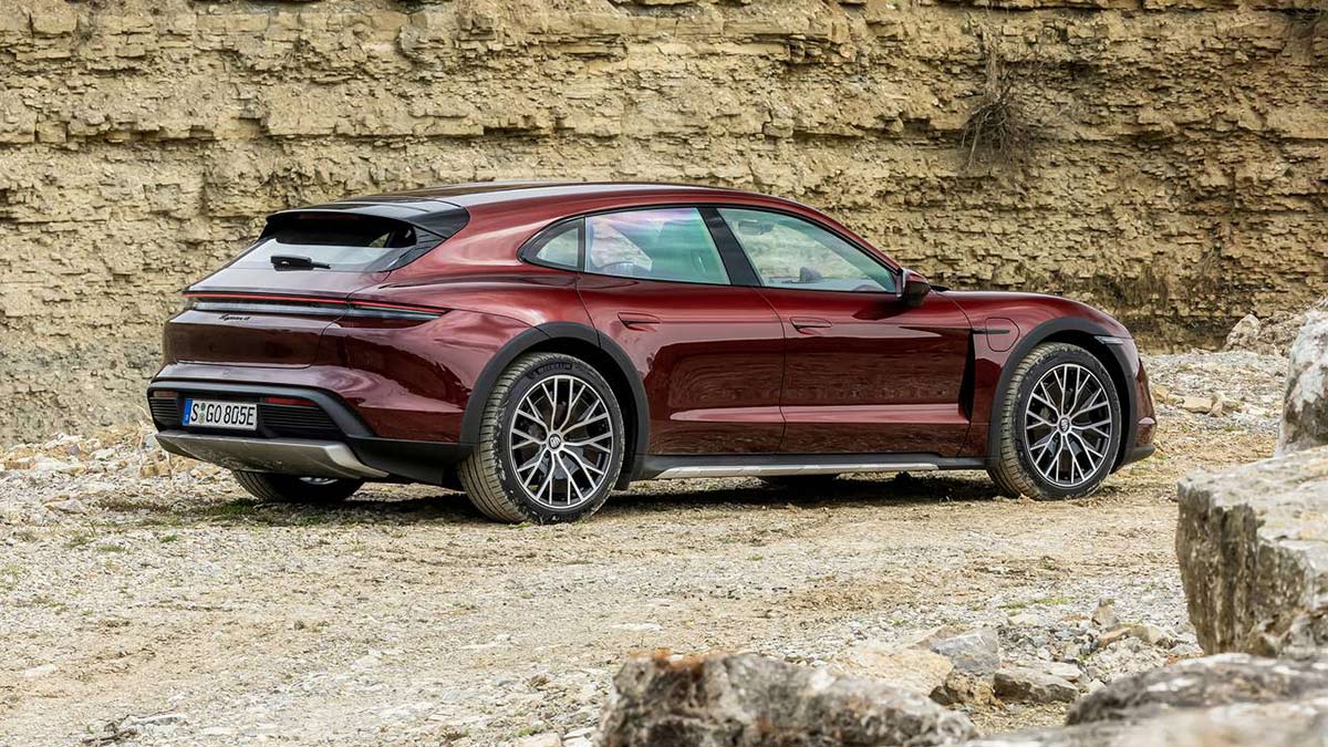 2023 Porsche Taycan Cross Turismo in dark red.