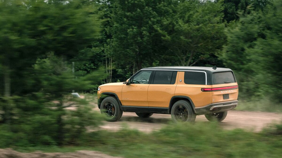 2023 Rivian R1S in mustard yellow.