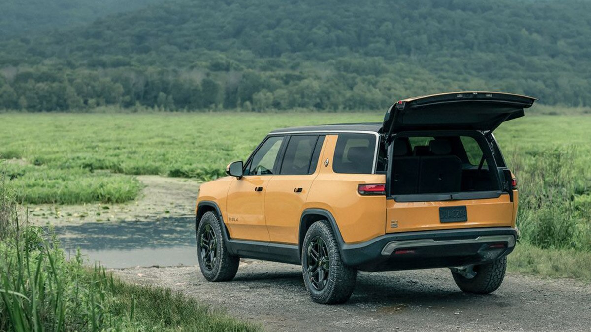 2023 Rivian R1S in mustard yellow.
