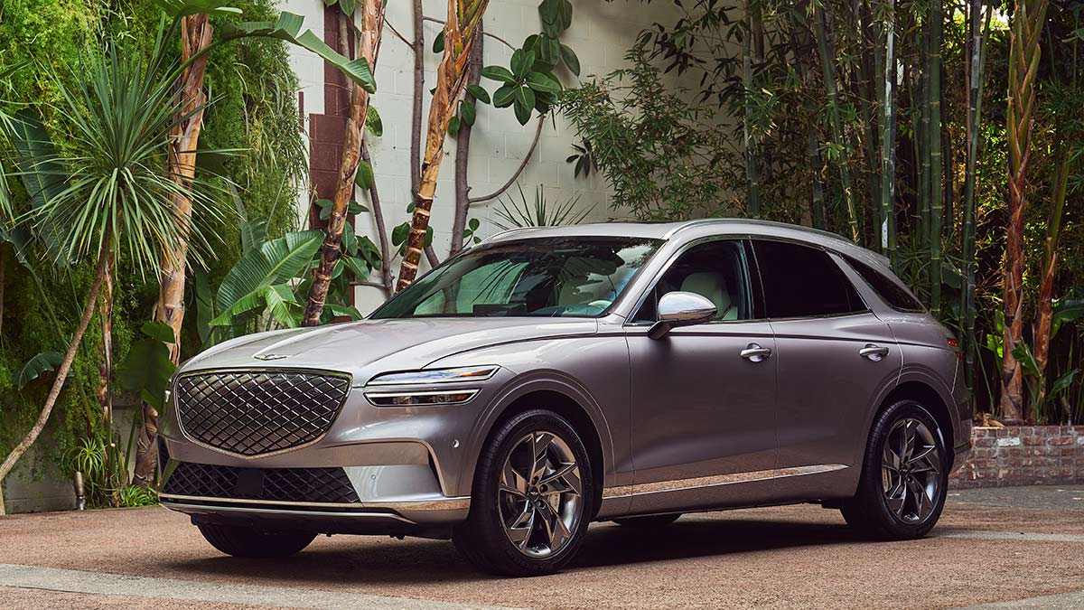 2023 Genesis Electrified GV70 in metallic pink.