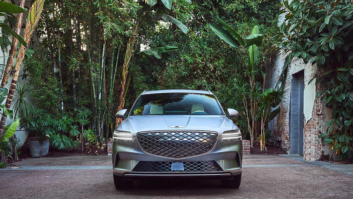2023 Genesis Electrified GV70 in metallic pink.