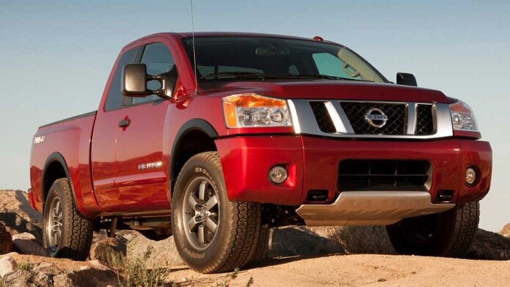 2014 Nissan Titan in red.
