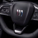 2024 Buick Encore GX Sport Touring. Close up view of the flat-bottom steering.