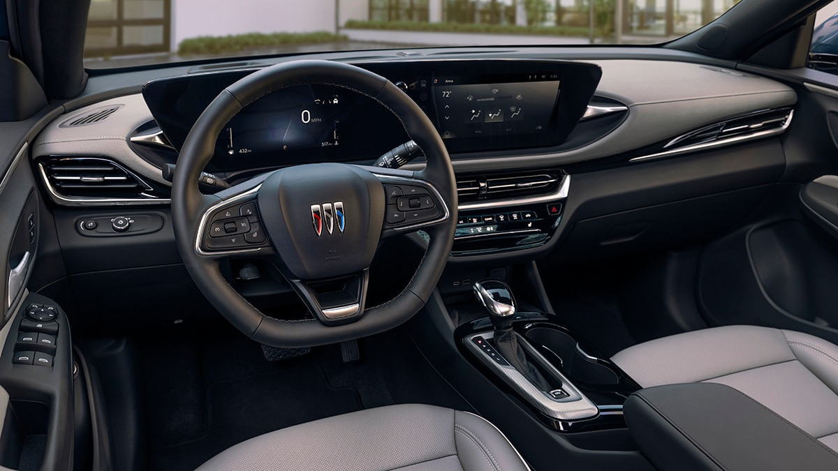 View of the driver’s seat in 2024 Buick Envista Avenir interior in Gideon with Ebony accents. Preproduction model shown. Actual production model may vary. Available in summer 2023.