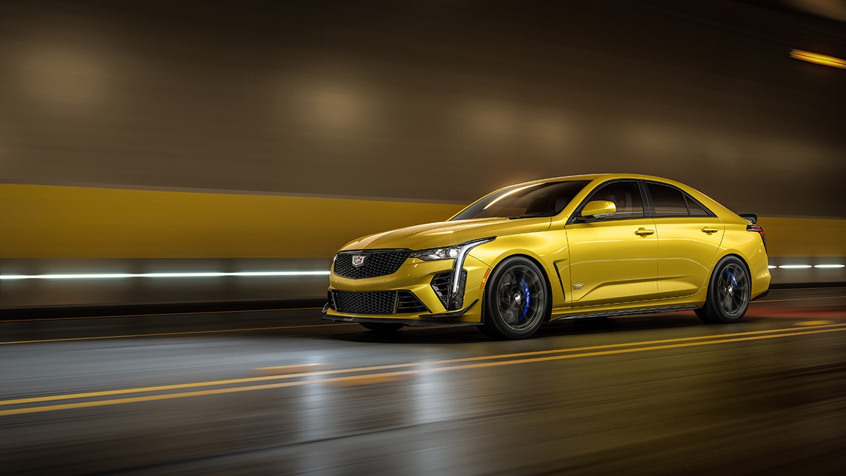 2024 Cadillac CT4 in metallic yellow.